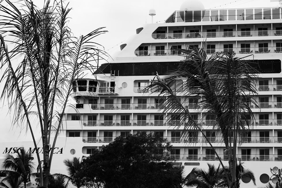 Beyond its promised opulence and entertainment, the cruise becomes a space of forced introspection, where time seems to dissolve and human presence turns fleeting against the vastness of the ocean.