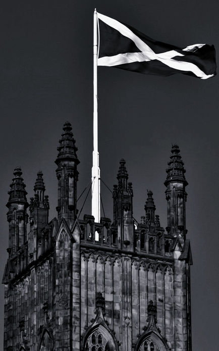 St John’s Church, Edinburgh — 19th-century Neo-Gothic church with the Scottish Saltire (St Andrew’s Cross) flying above its tower, a key landmark in the city centre.