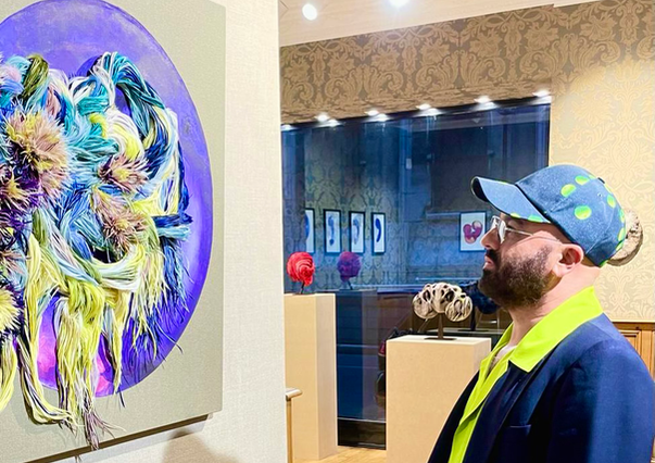 Visitor viewing Bliss during Laurence Le Constant's solo exhibition A Call to Heaven.