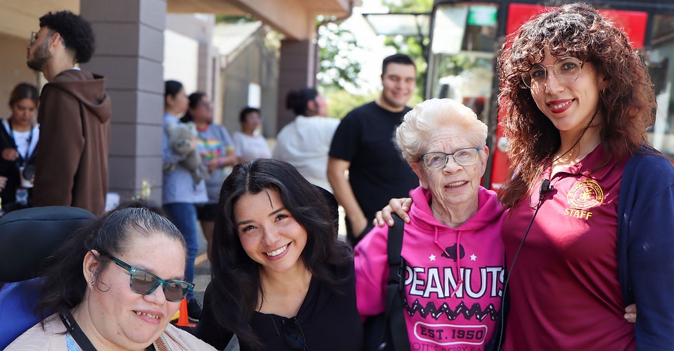 Diverse group of smiling women at a supported employment event.
