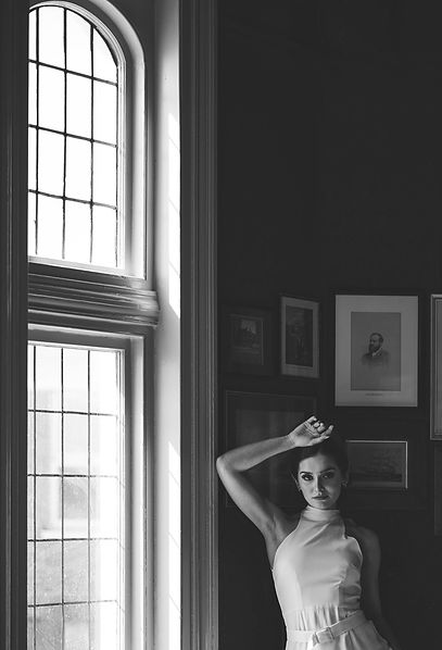 Bride in editorial pose by window at The Red Lion