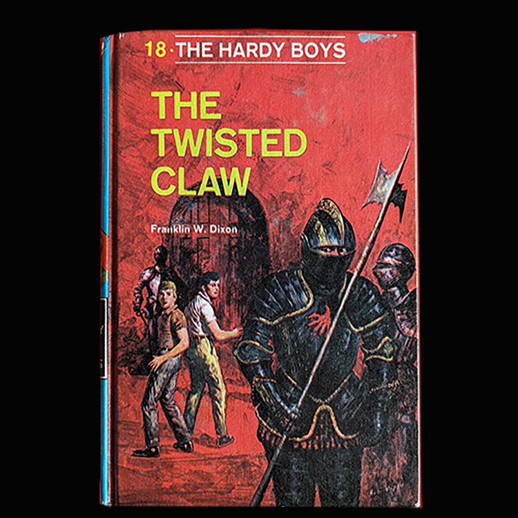 This is a picture of the Hardy Boys Book 18 The Twisted Claw (1969): The Hardy Boys Mystery