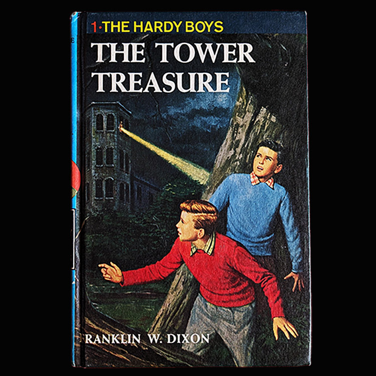 This is a picture of the Hardy Boys Book 01 The Tower Treasure (Blue Bar): The Hardy Boys Mystery