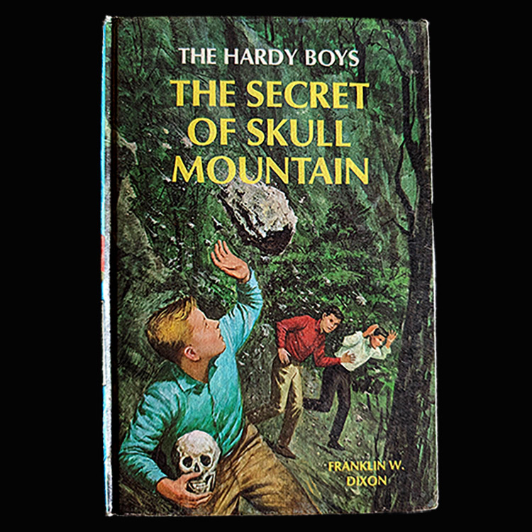 This is a picture of the Hardy Boys Book 27 The Secret of Skull Mountain (1966): The Hardy Boys Mystery