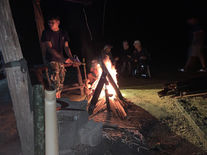 Evening campfire experience in Khao Sok National Park rainforest