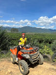 ATV rider overlooking the Khao Sok landscape