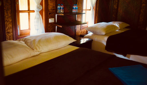 Family floating room at Praiwan Raft House with private veranda and lake views on Cheow Lan Lake, Khao Sok National Park.
