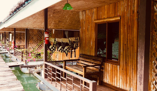 Family floating room at Praiwan Raft House with private veranda and lake views on Cheow Lan Lake, Khao Sok National Park.