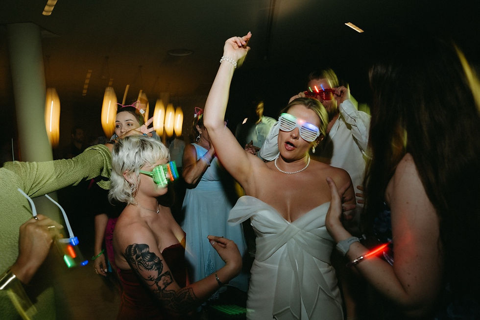 Bride and friends dancing in luxury destination wedding at grand palladium costa mujeres 
