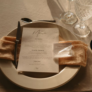 Printed wedding menu on an elegant place setting in Riviera Maya