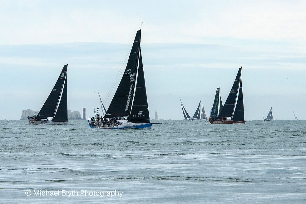 Fastnet race 2025, yacht, Van Uden races on open sea. Cloudy sky sets a dynamic mood.© Michael Blyth Photography visible in the corner.