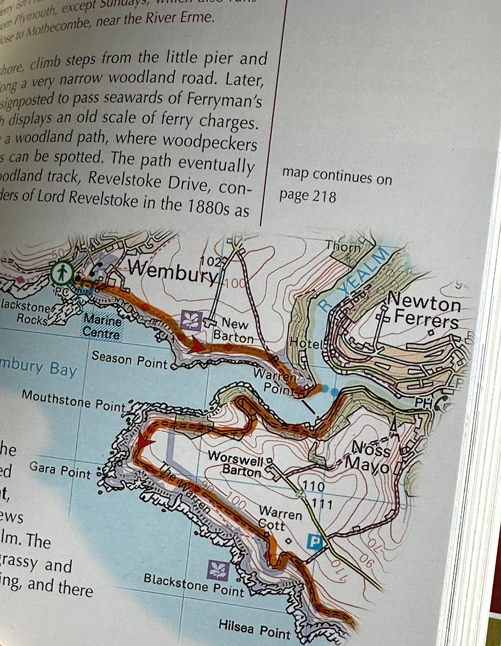 Map showing Wembury, Newton Ferrers, and Noss Mayo. Includes trails, elevations, and landmarks like Worswell Barton. Text and page lines visible, Cicerone Books.