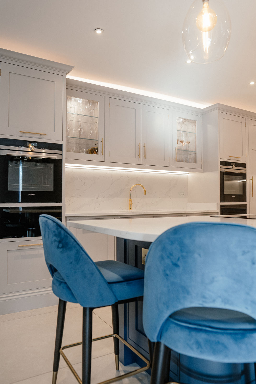 Bespoke kitchen with glass cabinets