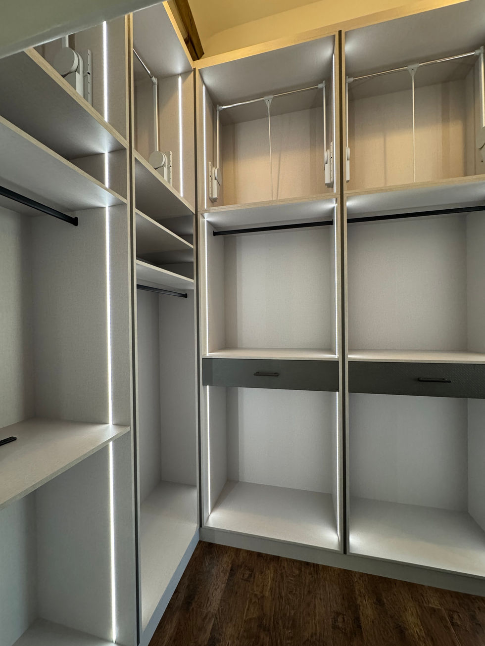 Entrance into luxury dressing room in a modern style with LED lights and floating drawers