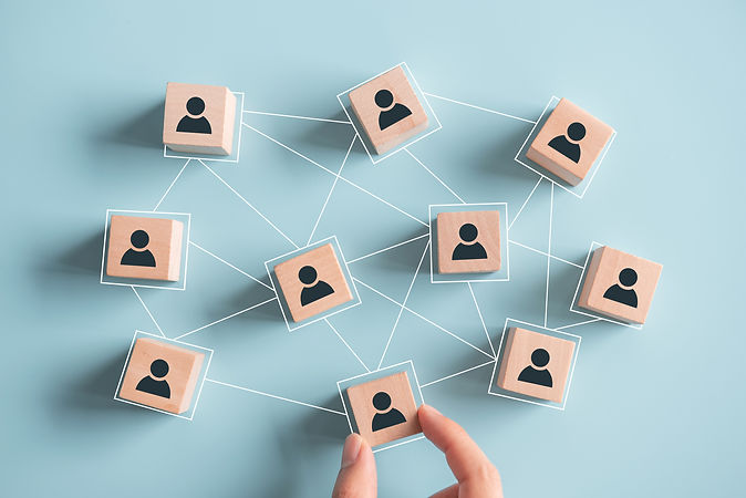 building-a-strong-team-wooden-blocks-with-people-icon-on-blue-background-human-resources-a