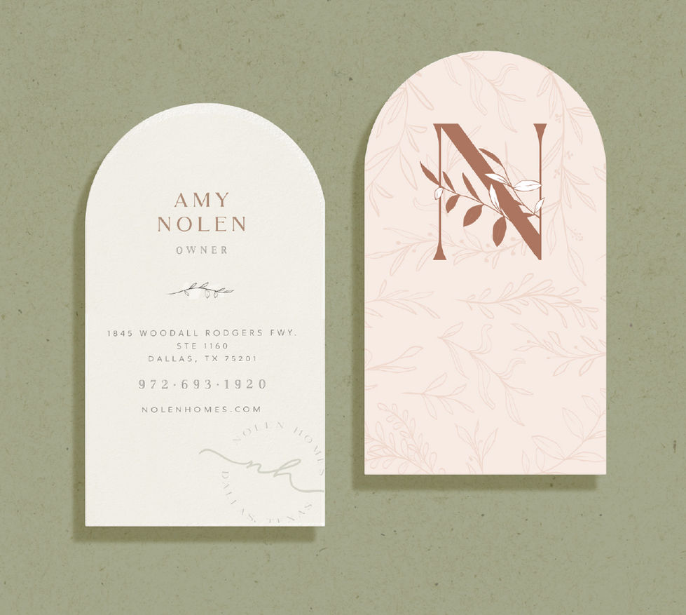 Nolen Homes branded stationery including arched business card and tag with monogram logo in soft neutral and blush tones