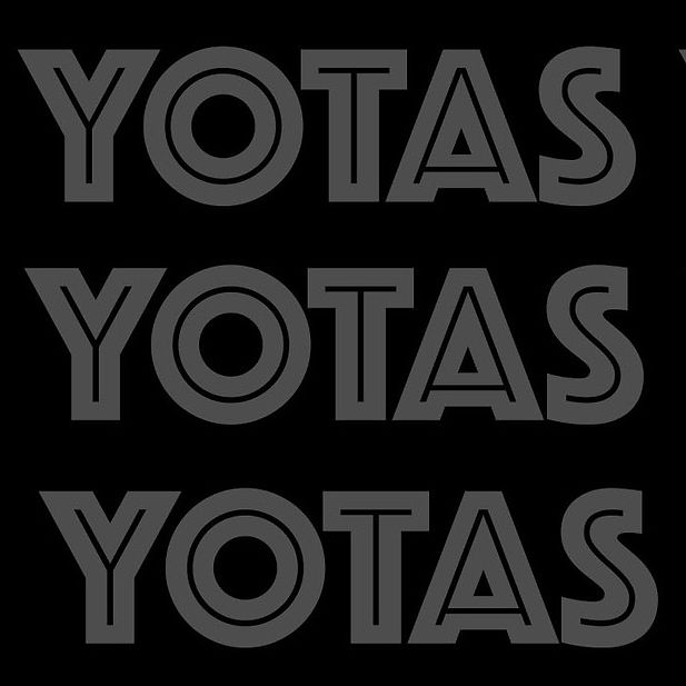 Yotas Yotas Yotas Logo in background