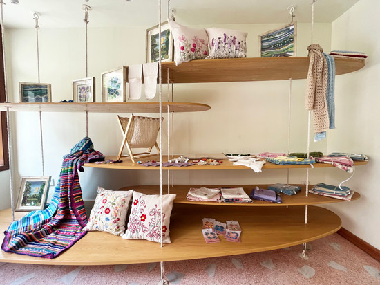 floating-wooden-shelves-of-varying-sinuous-forms-juxtaposed-to-create-a-display.jpeg