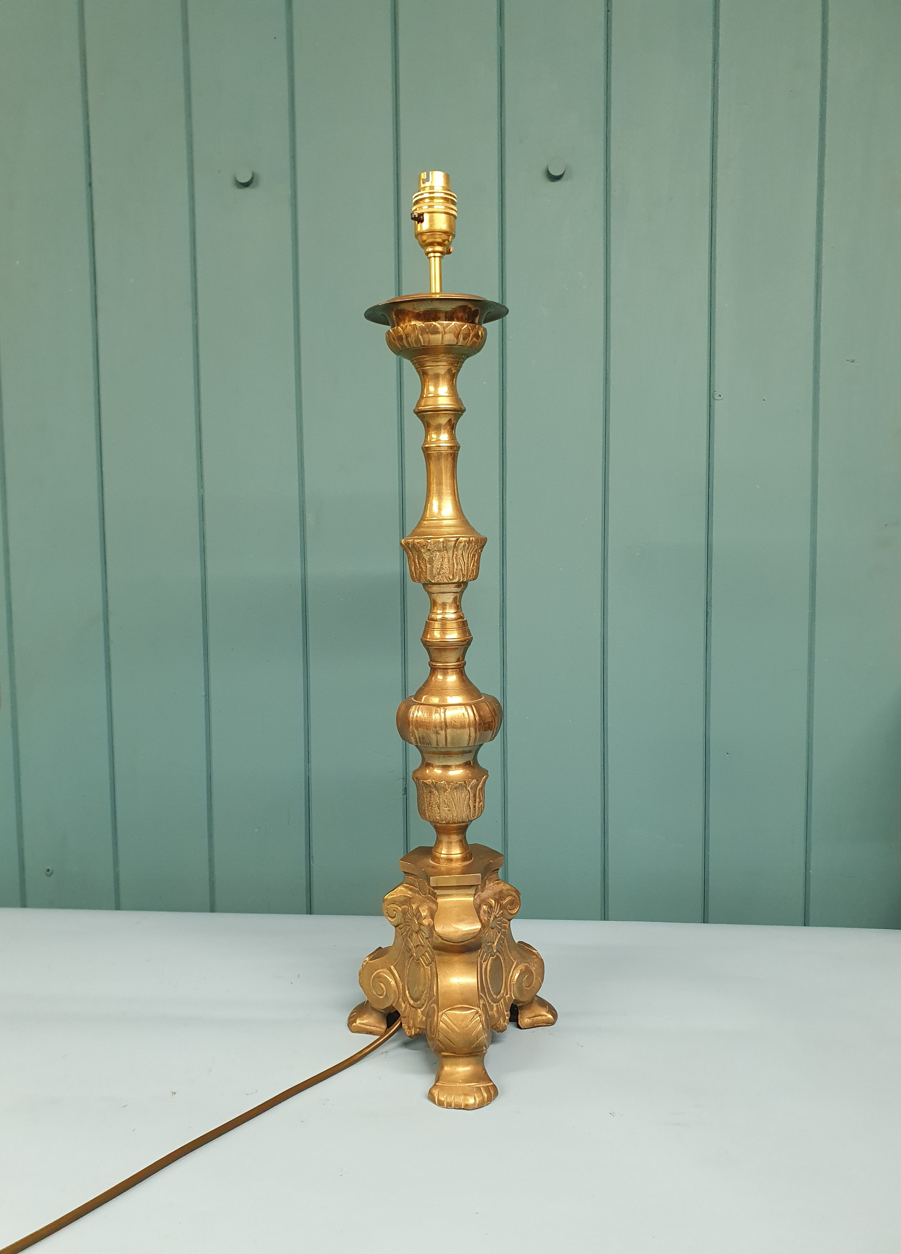 Early 20th century single baroque style brass candlesticks