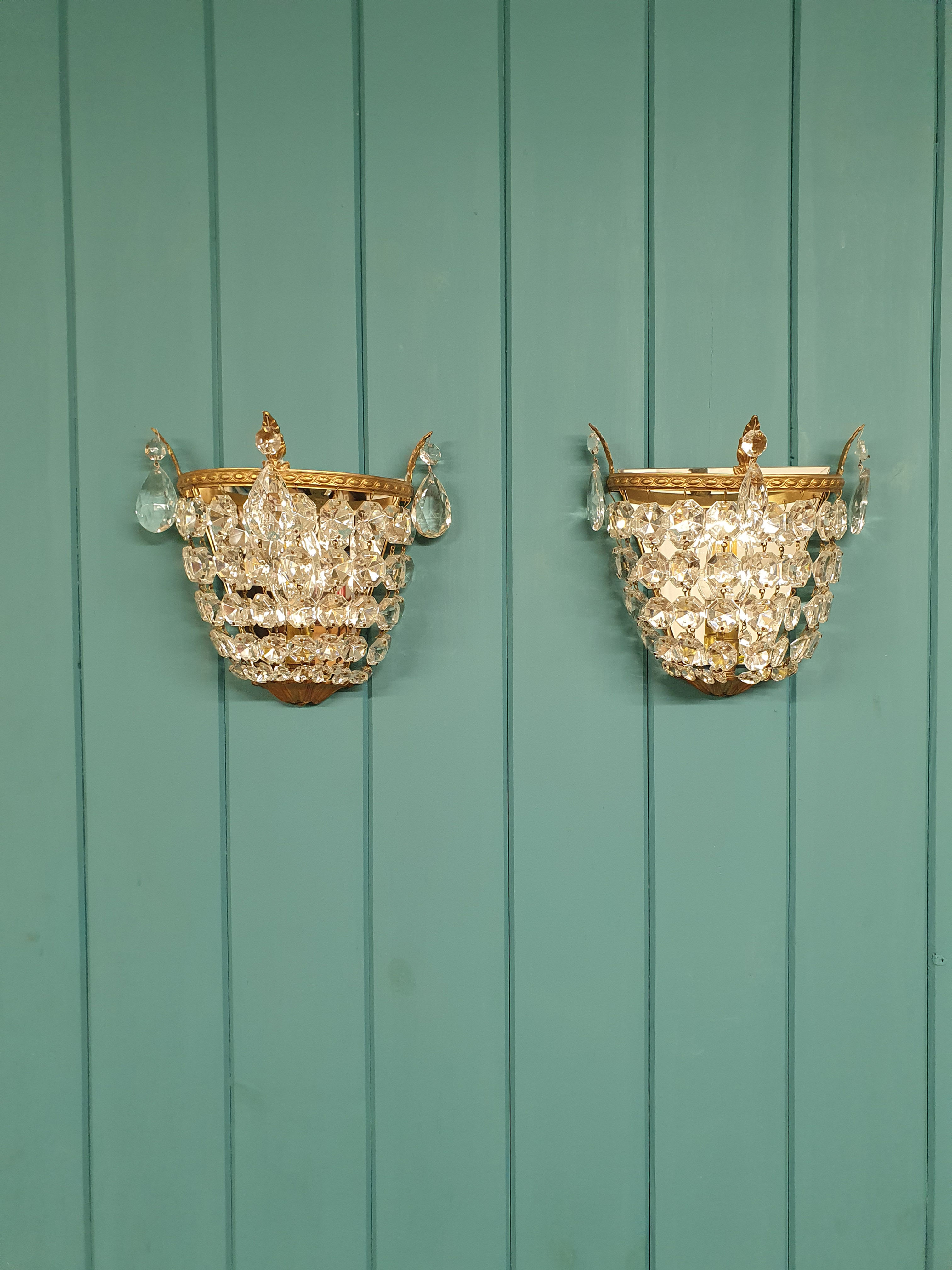 Pair of basket wall lights with mirrored backs