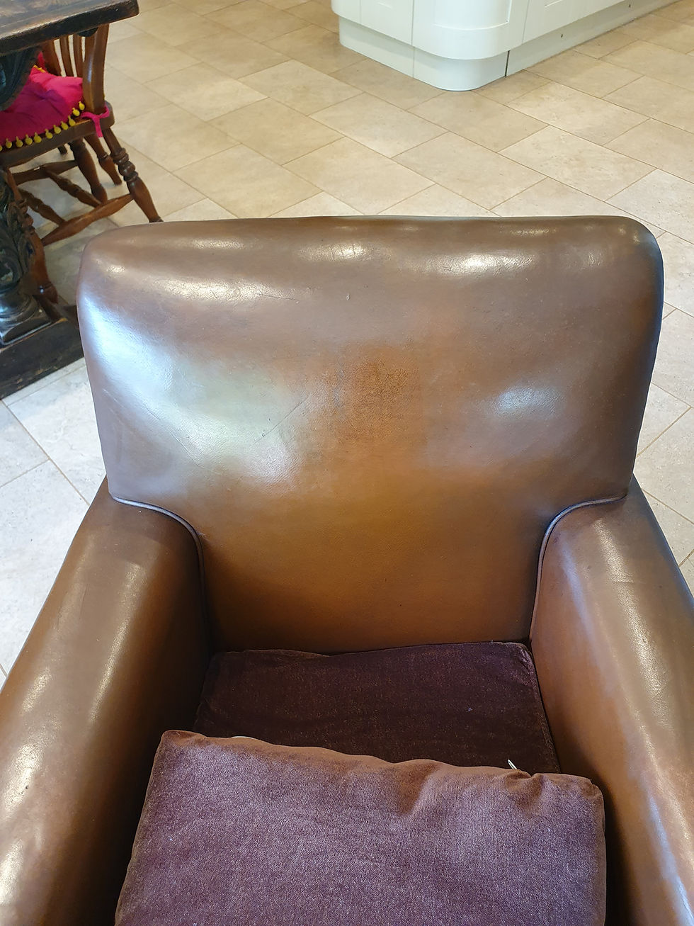 Thumbnail: Early 20th century pair of chocolate brown leather chairs