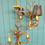 Thumbnail: Pair of early 20th century chandeliers with gold leaves and Bali corns