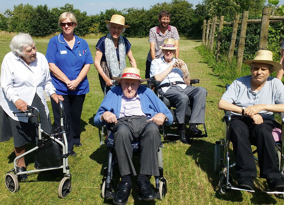 Wheelchair users tour the vineyard