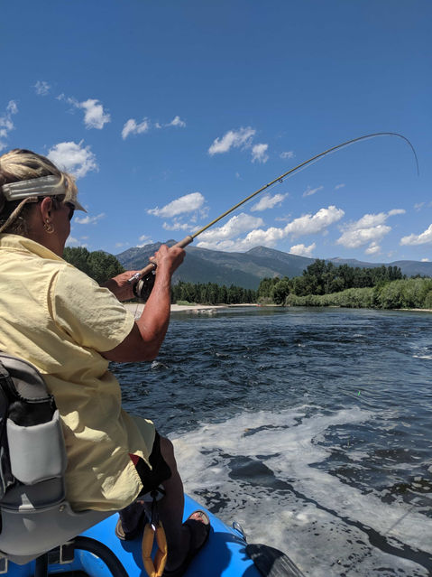 Photo of a fisherman on a Montana river