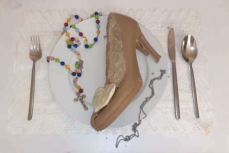 A chocolate shoe on a plate