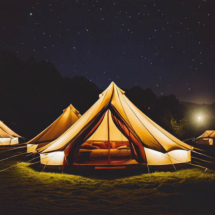 Bell tent village at night .jpg