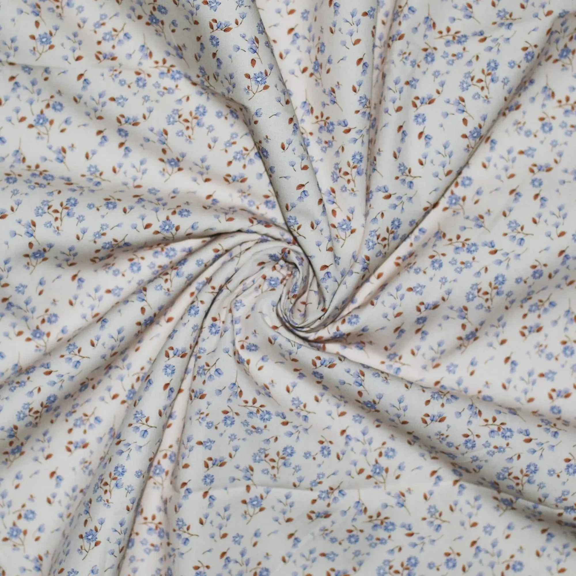 Popeline de coton fleurs bleues 10cm