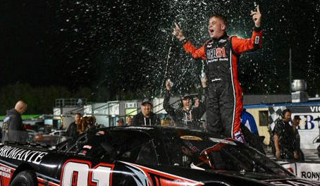 GIO ESCAPES THE CARNAGE FOR VICTORY AT FIVE FLAGS