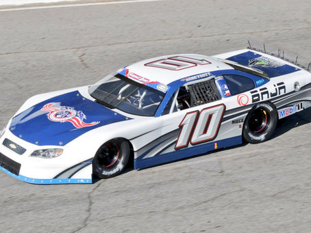 TEXAS DRIVER JUMPING IN WILSON’S SLM AT FIVE FLAGS