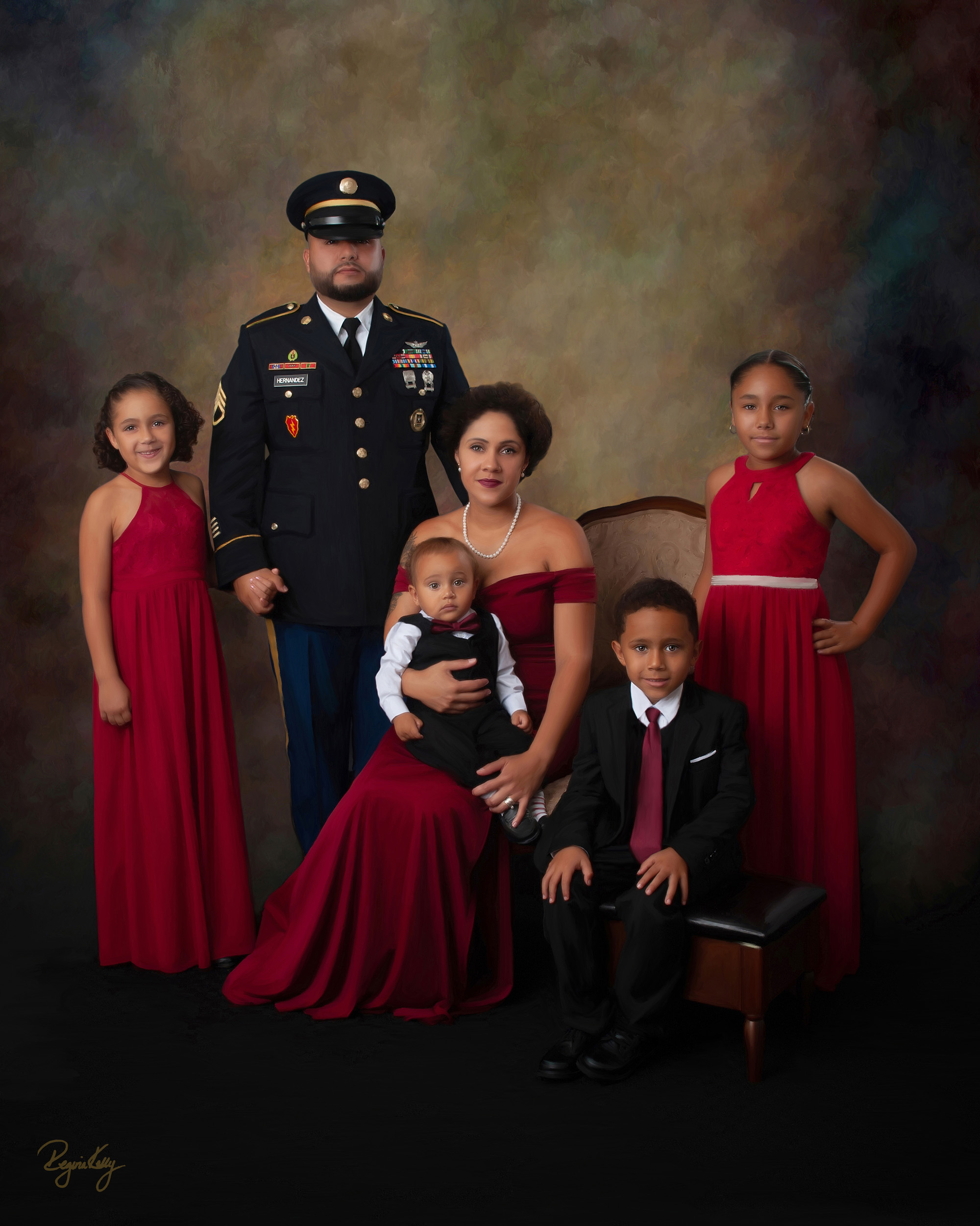 Fine art military family portrait, father in dress uniform with mother and children in red
