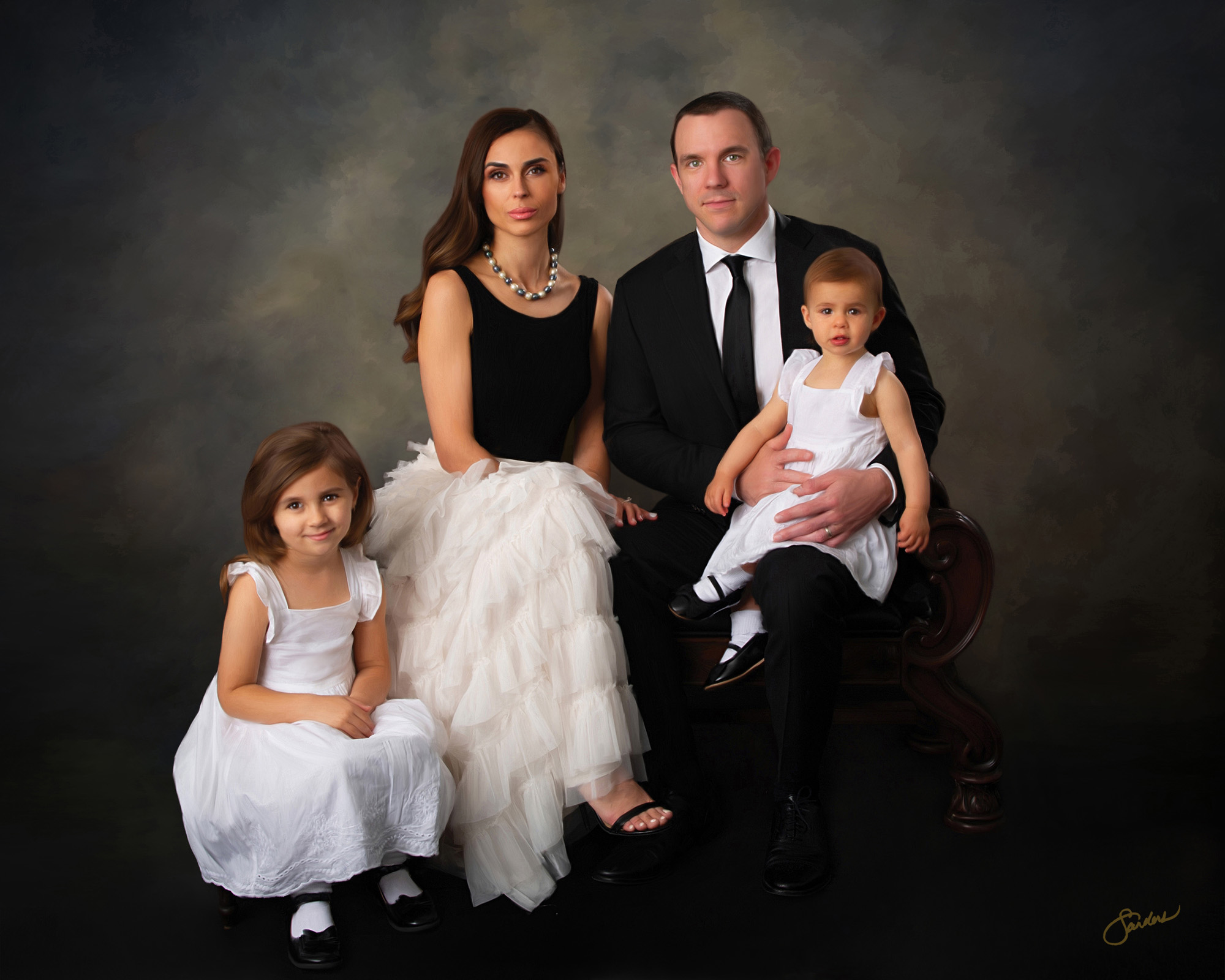 Fine art family portrait of parents and two young daughters in white dresses