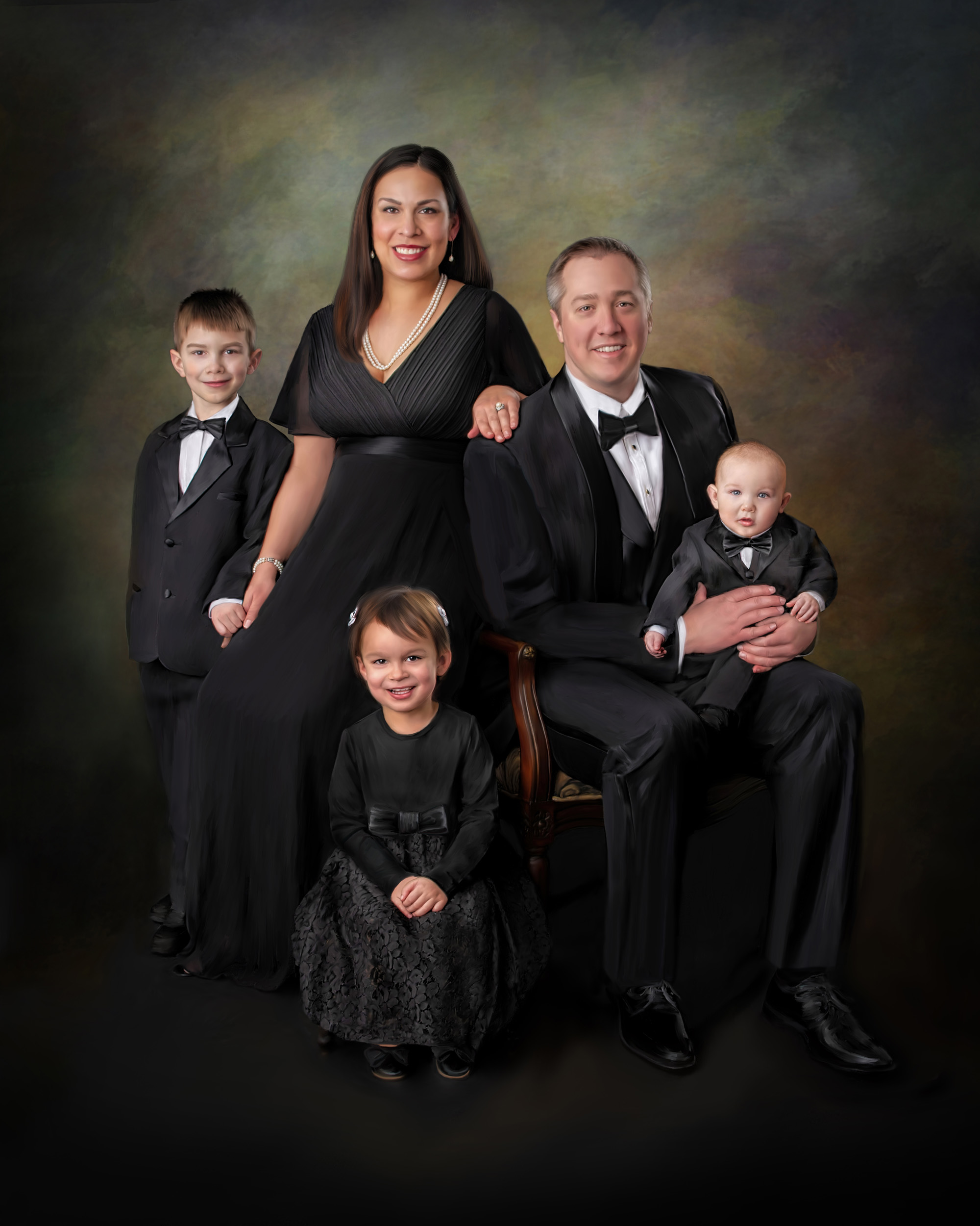 Fine art family portrait of parents and three young children in formal black attire