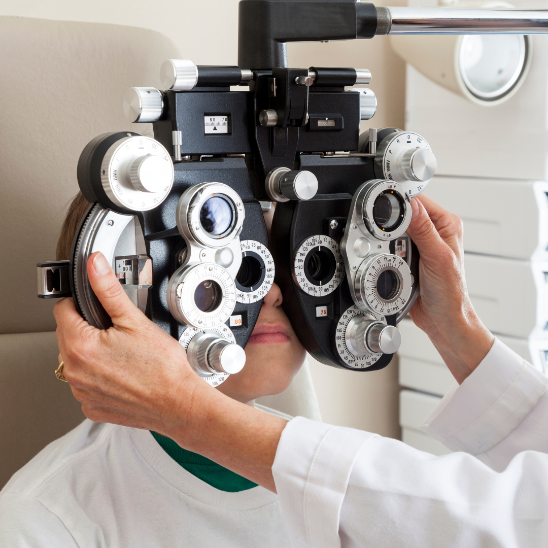 Patient checking out at medical office. Front desk staff asking what insurance to use. Vision vs. Medical