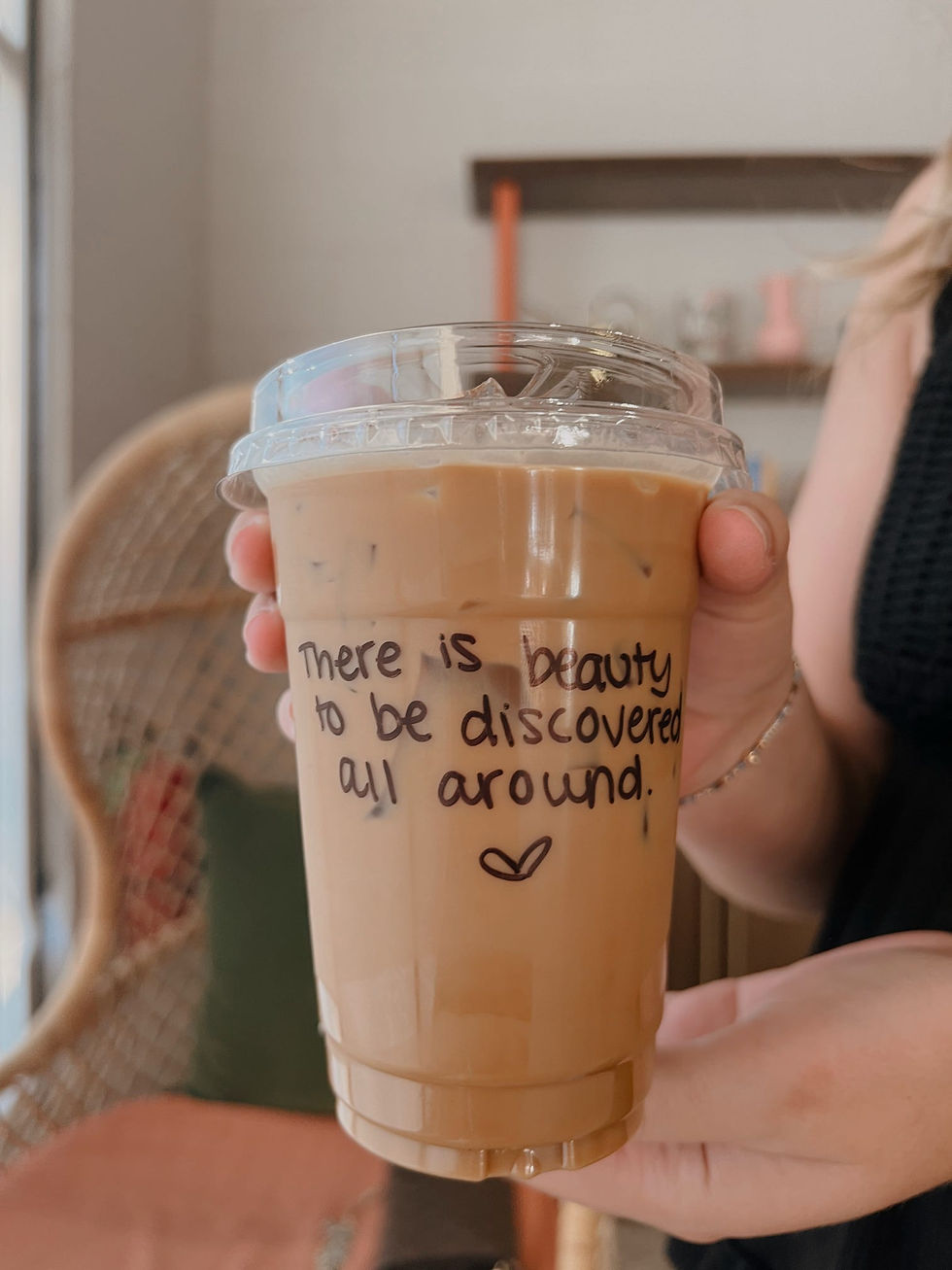 coffee cup with words on cup