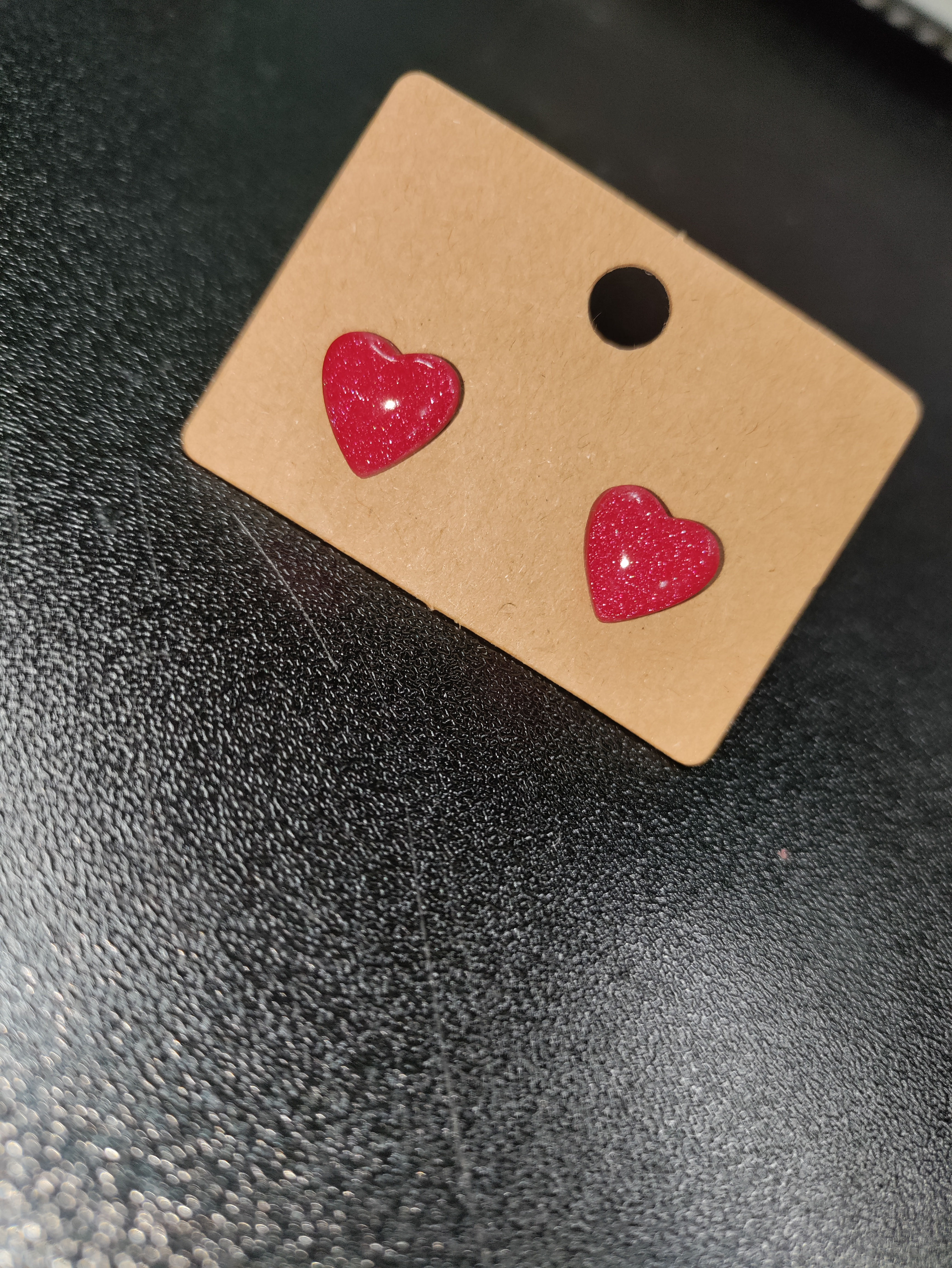 Sparkly red heart studs 