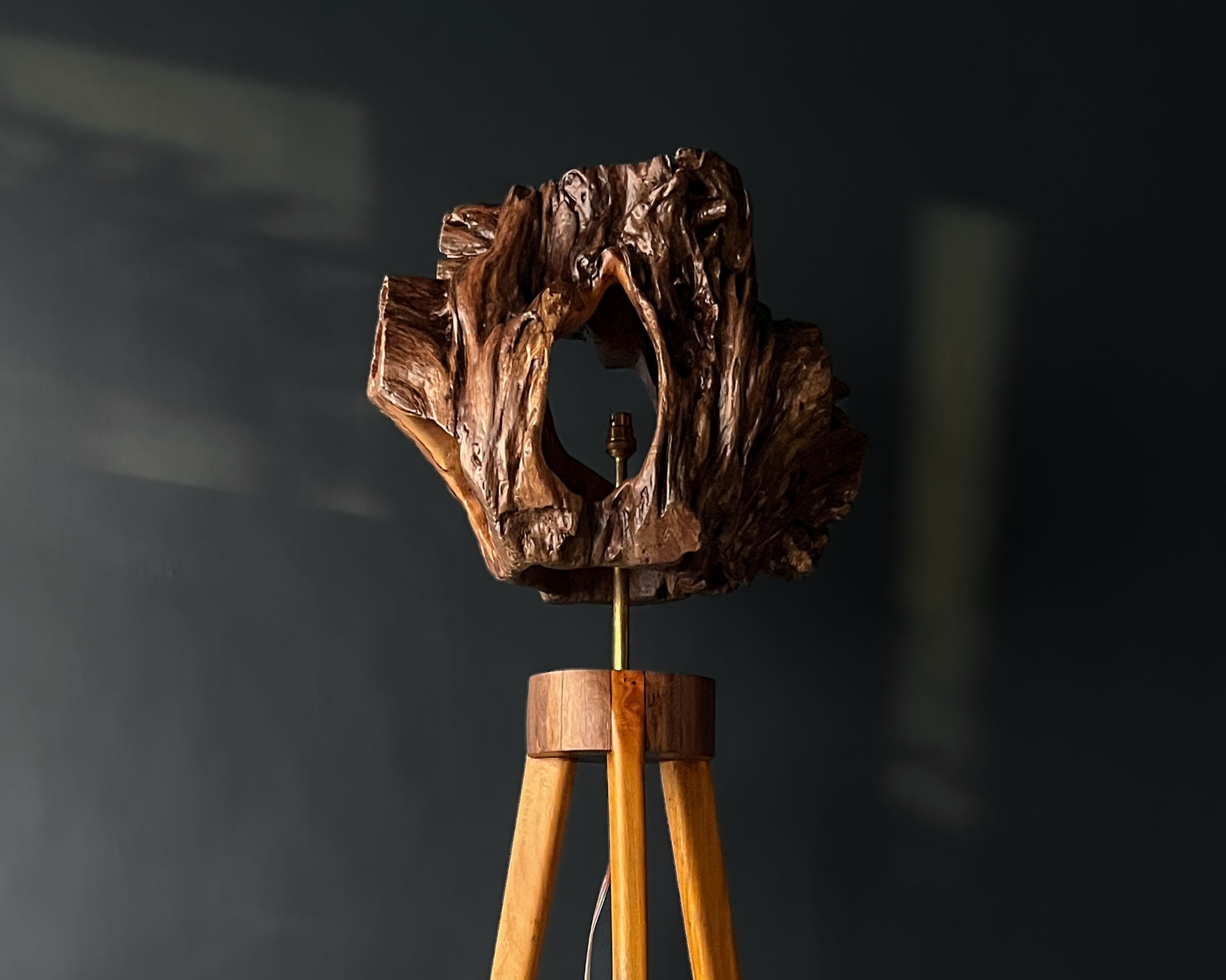 Floor lamp handcrafted from driftwood with tripod legs