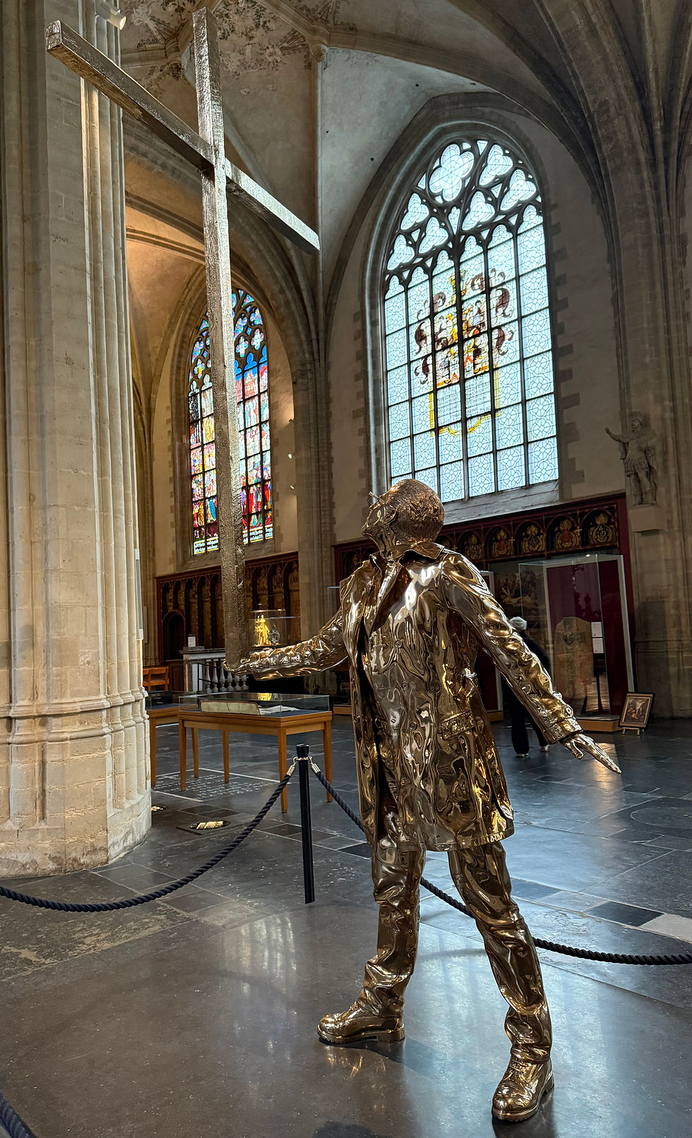 Must look this up to see what it represents.   The explanation was in Flemish!   To me it looks as though he's balancing his cross in life - as we all do!  Lucky he only has one!!