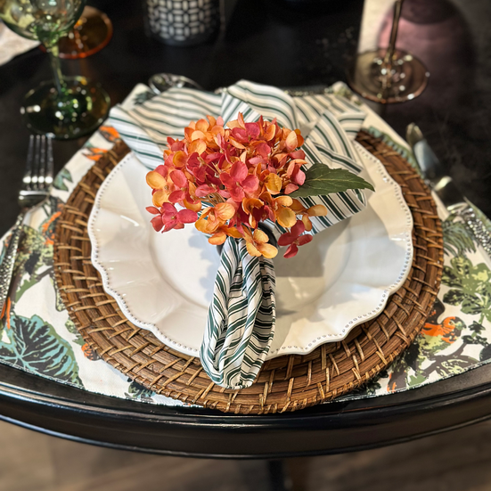 Chic skirt placemat with flowing, layered fabric edges, bringing a stylish and modern touch to any table.