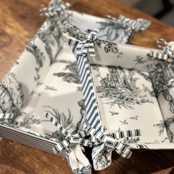 Handcrafted, elegant table basket, perfect for holding bread or small items while complementing any table decor.
