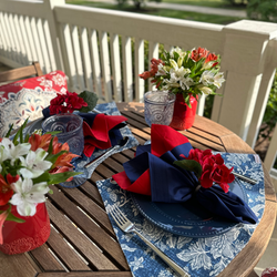 Chic skirt placemat with flowing, layered fabric edges, bringing a stylish and modern touch to any table.