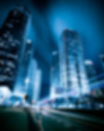 the light trails on the modern building background in shanghai china.jpg