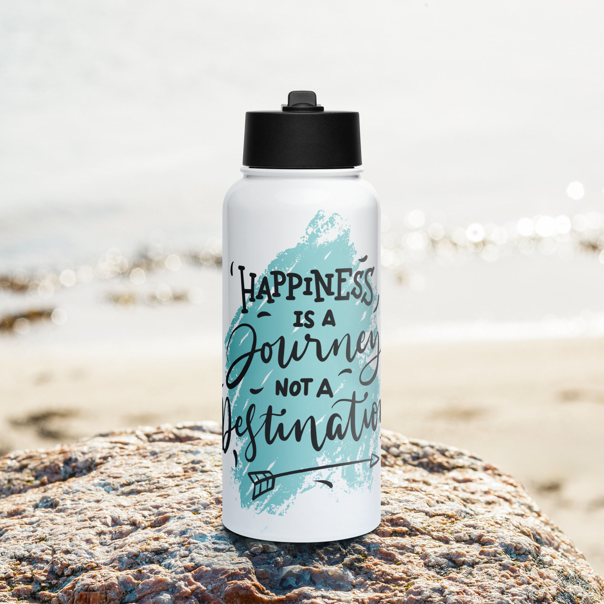 Stainless steel water bottle with a straw lid