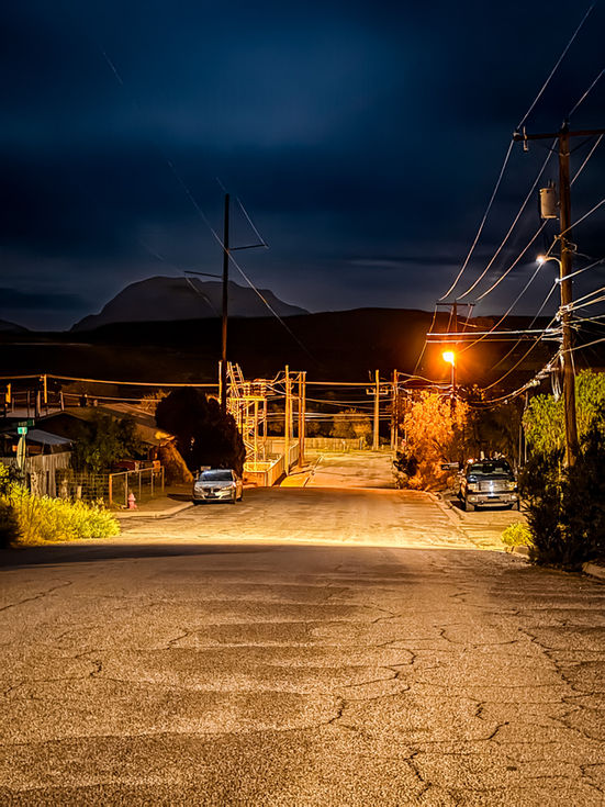 Midnight Stillness on a Storm-Lit Street