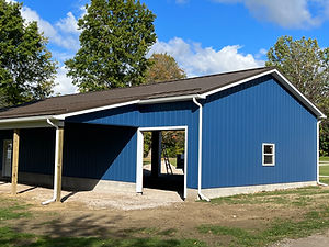 garage with blue siding