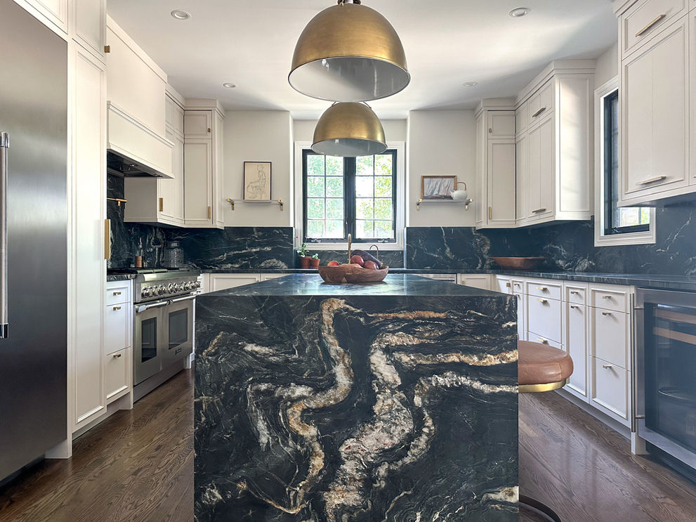 modern kitchen design with bold countertop and brass hardware