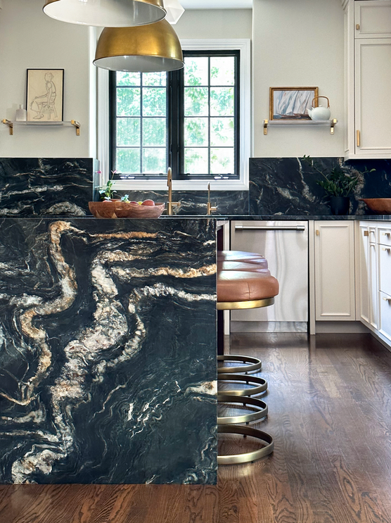 modern kitchen design with bold countertop and brass hardware